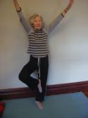 The Tree Posture is strengthening the legs for this student with osteoporosis