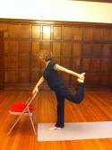 By using the chair the student can concentrate on improving the lifted leg position in Natarajasana